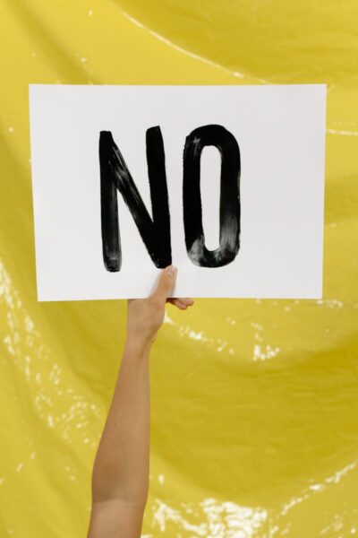 Human Holding a Banner